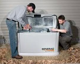 Electricians working on generator